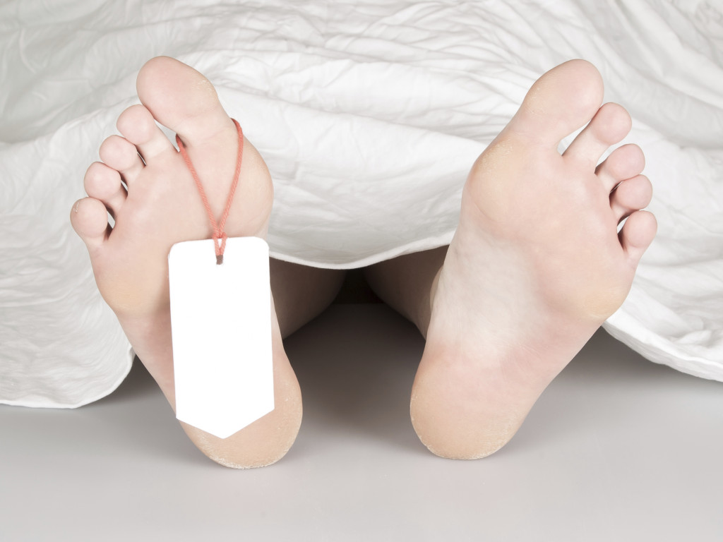 Dead body with toe tag